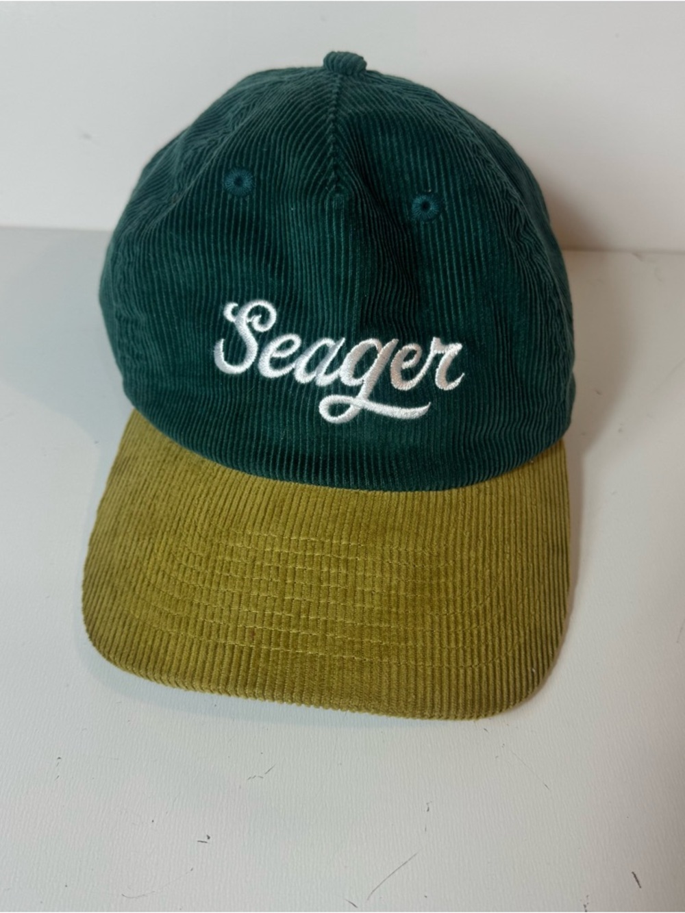 Seager Embroidered Corduroy Cap in Forest Green & Olive